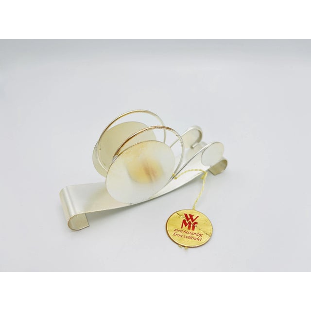 Metal Napkin Holder from WMF, in Flawless conditions. Designed 1960 to 1969 This piece has an attribution mark, I am sure...