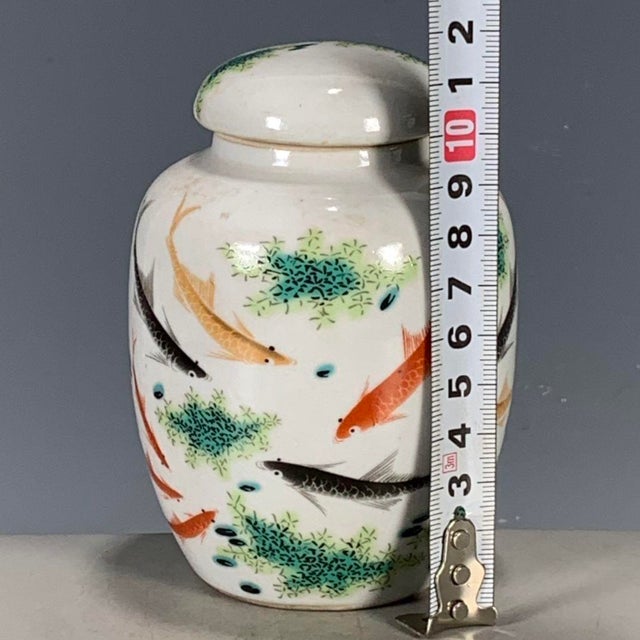 Chinese Vintage Chinese Famille Rose "Swimming Fish" Covered Jar With "Wan Yu" Mark For Sale - Image 3 of 9