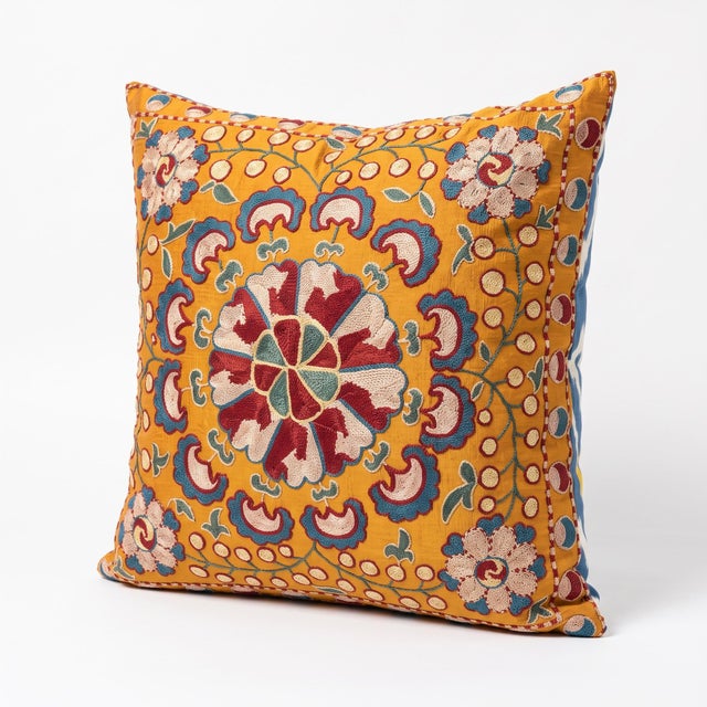 This beautiful hand embroidered suzani fabric is sourced from Uzbekistan. We cut and sew the pillow by hand in our Houston...