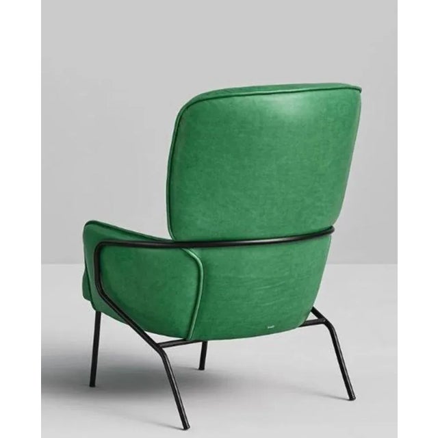 Leather armchair by Pepe Albargues A cozy and embracing armchair, an incredible piece that converges in a perfect balance...
