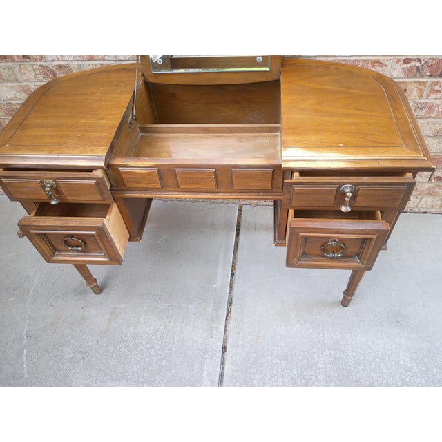 Beautiful vintage Drexel Esperanto "Poudre" vanity dressing table, circa 1960s, featuring warm pecan wood and veneers,...