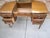 Beautiful vintage Drexel Esperanto "Poudre" vanity dressing table, circa 1960s, featuring warm pecan wood and veneers,...