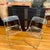 A pair of Italian Lucite folding chairs made in Italy by Giancarlo Piretti for Anonima Castelli. Purchased from original...