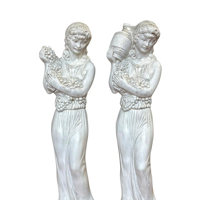 Bring the romance of classical Europe into your home with this elegant pair of Neoclassical figural table lamps inspired...