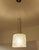 Set of 3 large Vintage mid century pendant light featuring a cylindrical structured murano glass shade mounted on an...
