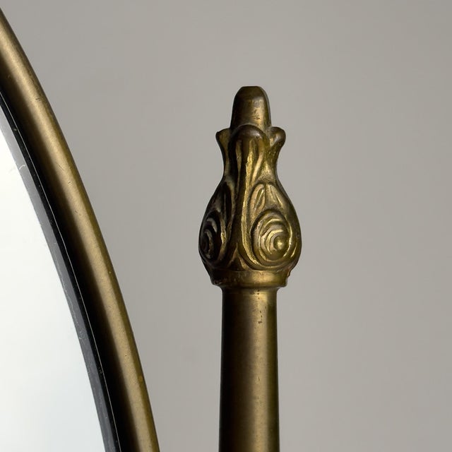 Original vintage tabletop vanity mirror (psiche) made of polished brass in a classic style. Made in Italy in the 1950s....