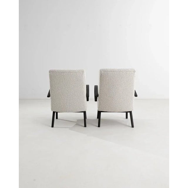 Produced in the former Czechoslovakia, this pair of bentwood armchairs from circa 1950 are re-upholstered with an updated...