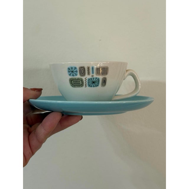 Bring mid-century charm to your table with this set of nine vintage Canonsburg Pottery “Temporama” salad plates, made in...