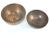 This set of two antique copper bowls is a beautiful representation of timeless craftsmanship and cultural artistry. Each...