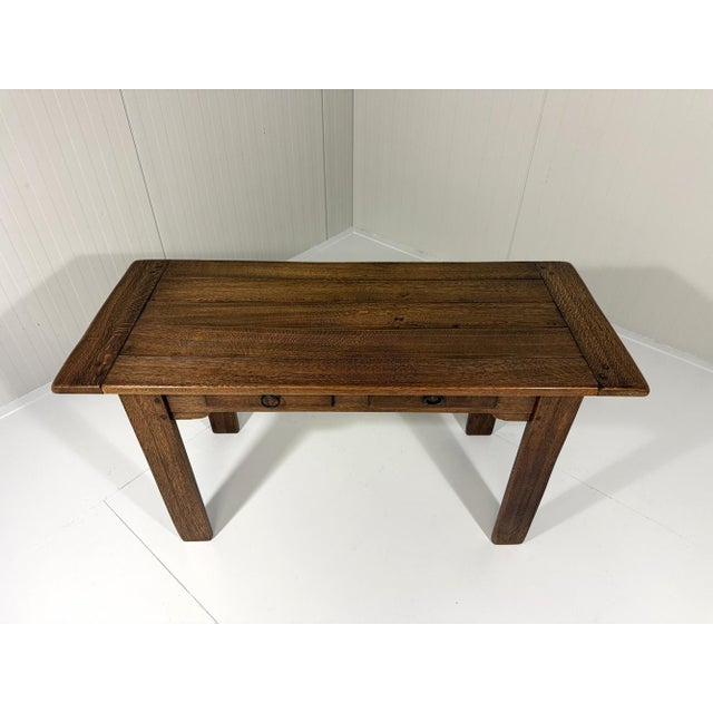 Beautiful rustic console table also to use as desk. Solid oak with visible wood joints, a nice designed tabletop, in front...