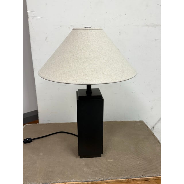 Design Plus Gallery presents a Square Column Table Lamp from Restoration Hardware. This sculptural lamp is defined by a...