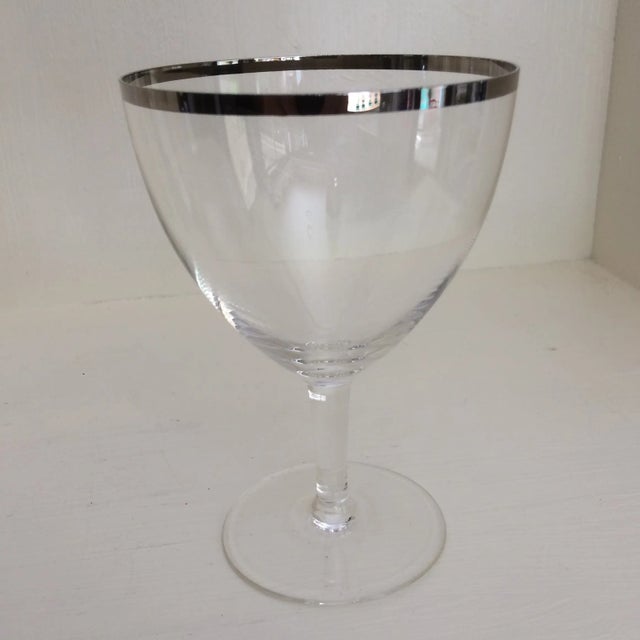 These glasses are simply elegant. This set of 4 are extremely thin and light with a tastefully placed platinum band around...