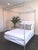 The Orleans Canopy Bed is meticulously handcrafted in New Orleans in the style of the Neo-classic period with a wrapped X...