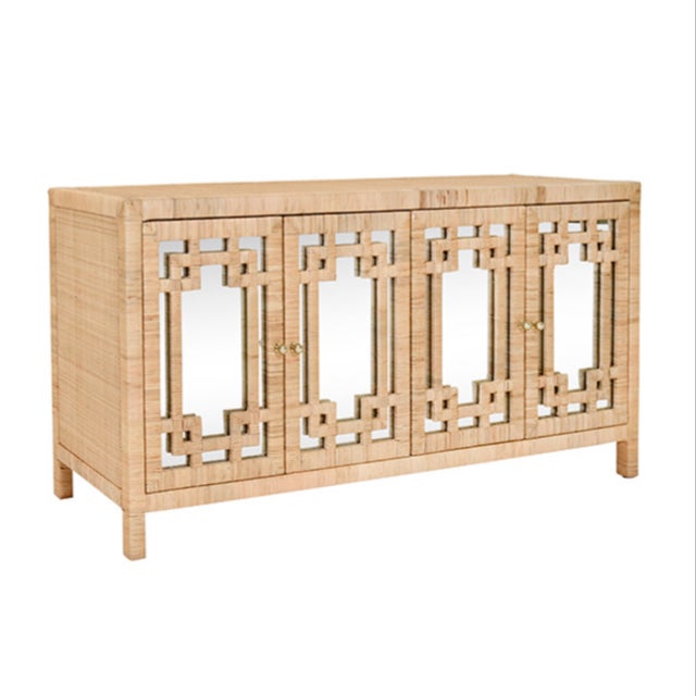 New special order item. Not vintage. Get ready to elevate your dining space with our Granada Natural Rattan Four Door...