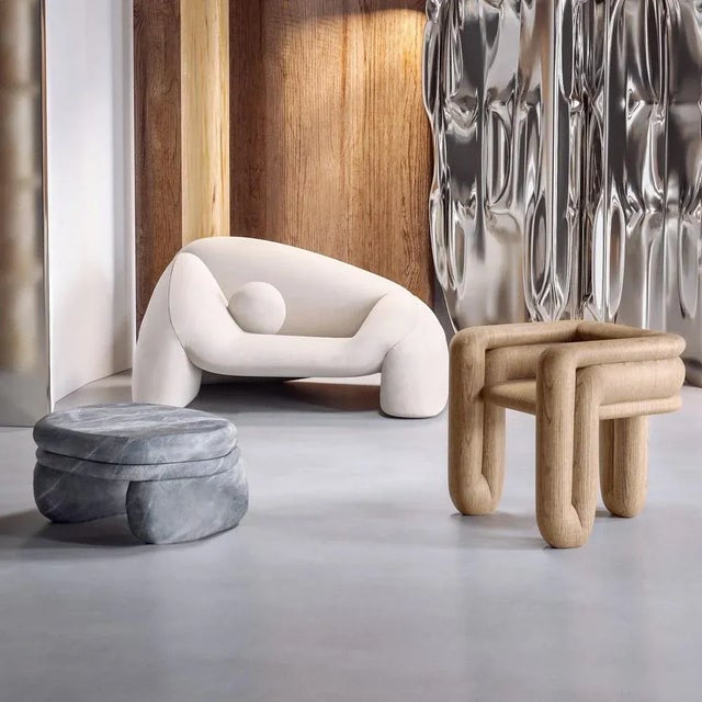 Enigma oak accent chair by alter ego studio dimensions: d 66 x w 83 x h 41 cm. Materials: oak. Also available in lacquered...