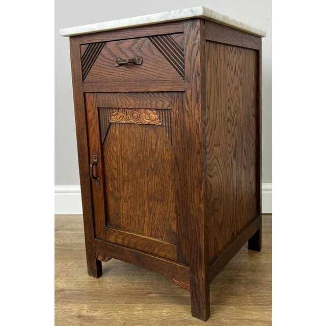 Add timeless French character to your home with this Antique French marble top bedside table , beautifully crafted in oak...