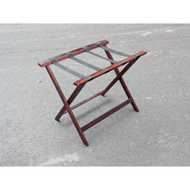 Elevate your guest room with this sophisticated dark wood luggage rack. Masterfully crafted from solid wood and heavy-duty...