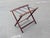 Elevate your guest room with this sophisticated dark wood luggage rack. Masterfully crafted from solid wood and heavy-duty...