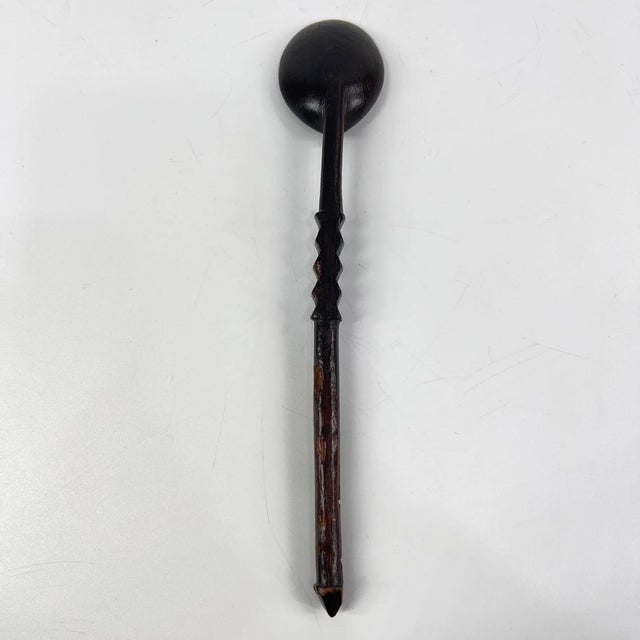 Zulu spoon from the early - mid 20th century. Dark, natural, worn patina. Zulu spoons were carved by men only, out of a...