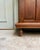 Elegant solid oak entryway coat rack dating from the early 20th century. Tall and narrow, it combines a coat rack, mirror,...