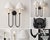 Elegant and highly sought-after Ingela Double Wall Sconce designed by Amber Lewis for Visual Comfort, a celebrated...