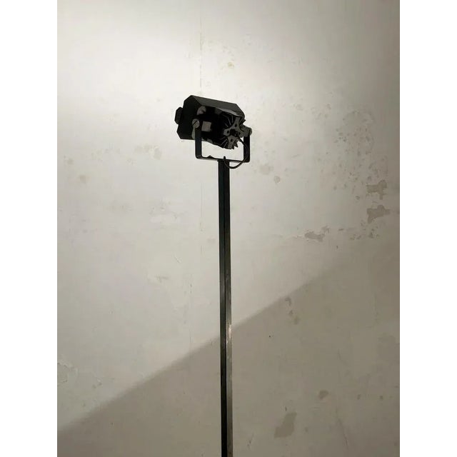 A minimal and radical adjustable floor lamp, post-modernist, bauhaus, constructivist, square black lacquered metal base...