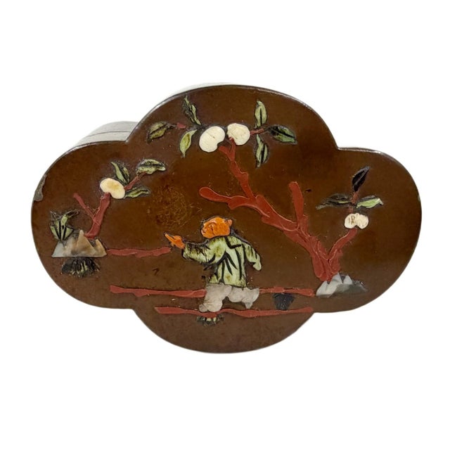 Antique Chinese Begonia-Shaped Black Lacquer Trinket Box with Hardstone Inlay, Circa 1920s An authentic early 20th-century...