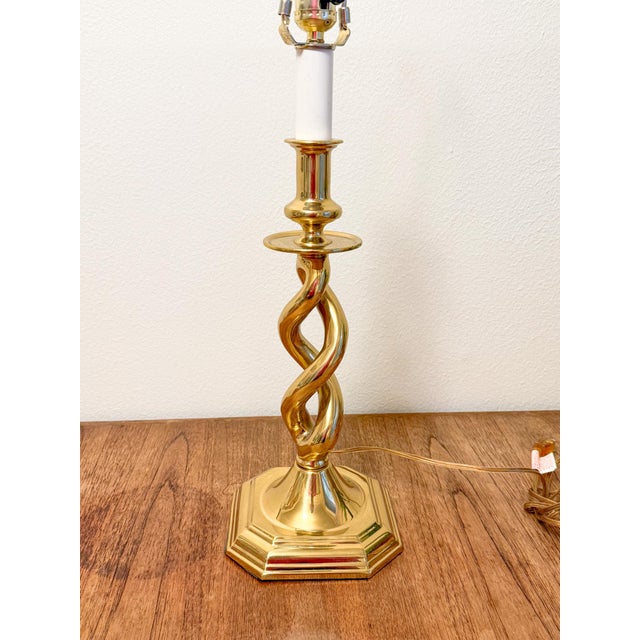 Lovely classic double helix barley twist brass table lamp. It may be by Stiffel, but there are no markings. It has a cute...