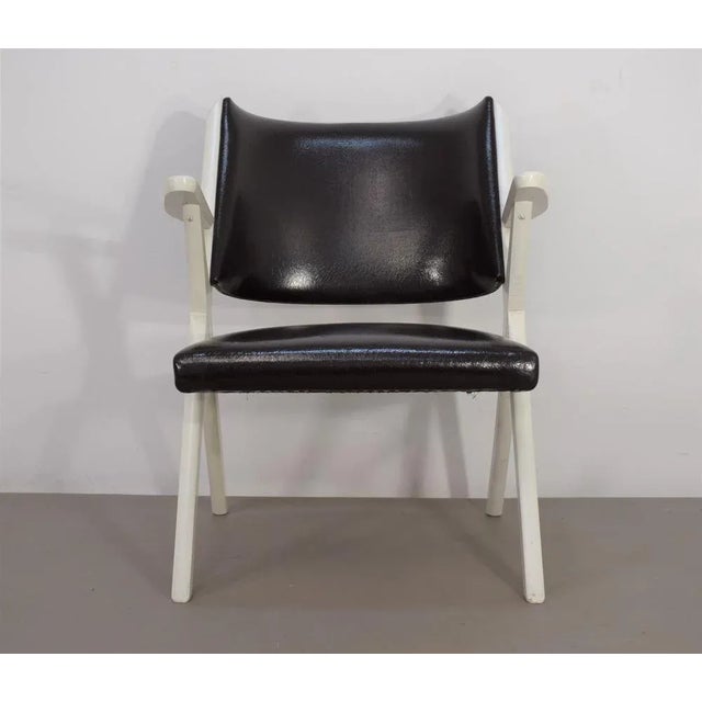 Couple of production armchairs from Vera, signed, Italy, 1950s. Wood and eco -leather. Good general conditions, no breaks,...
