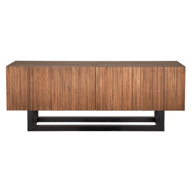 Crafted from premium walnut wood and veneer, complemented by industrial-grade steel accents, the Thomson Sideboard exudes...
