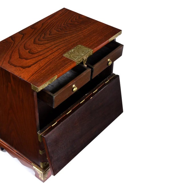 This unique, petite Asian chest is made of rosewood and decorated with ornate Korean brass. The combination of the richly...