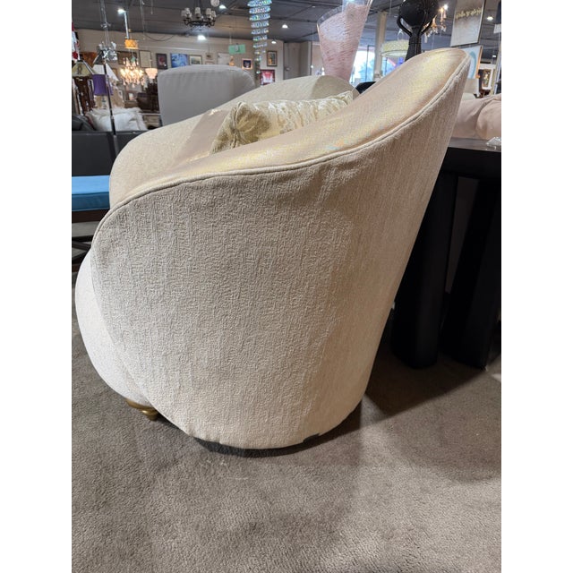 A glamorous statement piece from Michael Amini, this Beige and Gold Satin Accent Chair embodies modern luxury with a...