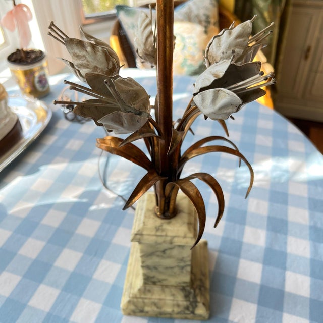 This is a beautiful vintage marble lamp with lovely tile tulips and carved vase details with the charming vintage look of...