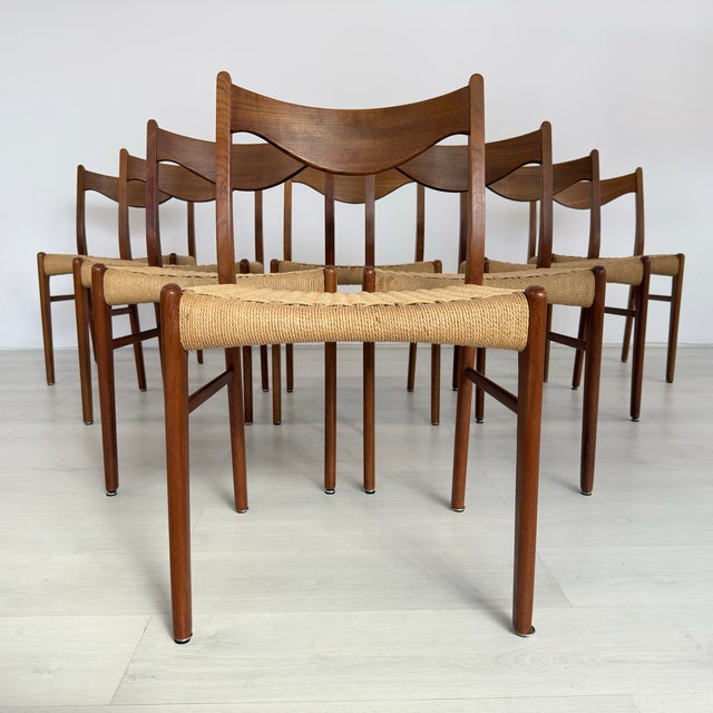 Dimensions: H 31.5” x W 19” x D 18” x SH 18” Set of 8 Vintage Danish dining chairs designed by Arne Wahl Iversen for...