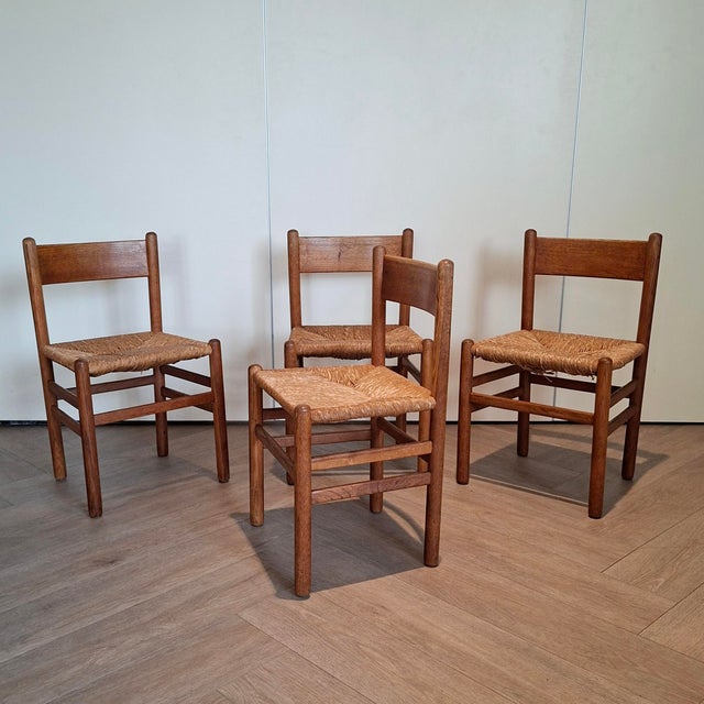 These chairs with rush seats were designed in the late 50s by the Dutch designer Johan van Heuvel and produced by Ad Vorm....