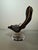 Swedish mid-century swivel lounge chair model T213 by Göte Möbler Nässjö. Upholstered in smooth black leather and mounted...