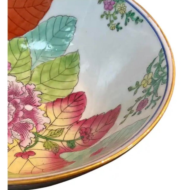 Vintage 20th Century Chinese Export Hand-Painted Tobacco Leaf Bowl with Gold Rim. Bowl features richly enameled,...