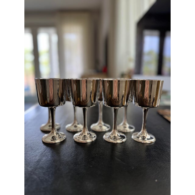 Elevate your entertaining with this exquisite set of [insert number] vintage sterling silver goblets. With their timeless...