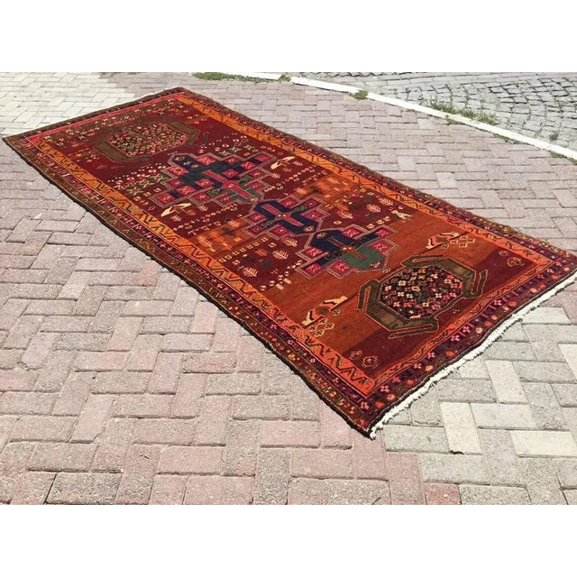 This gorgeous hand knotted Vintage Anatolian area rug is approximately 60 years old in excellent vintage condition. The...