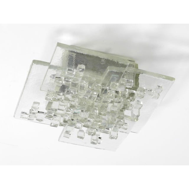 Beautiful large italian wall lamp from the 1970s. can also be mounted to the ceiling. made entirely of murano glass....