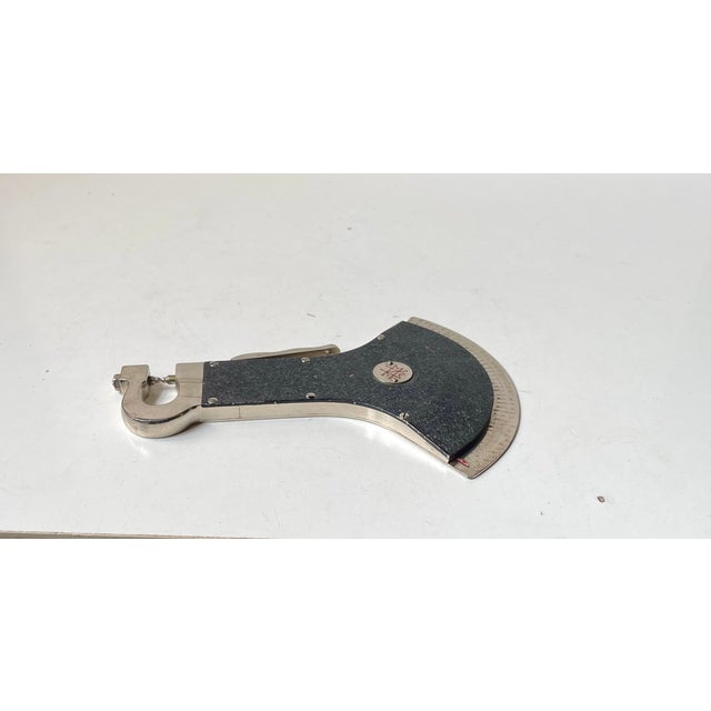 Scientific or toolmakers micrometer. Distinct axe-head shade. Made in Germany during the 1950s or 60s. It is made from...