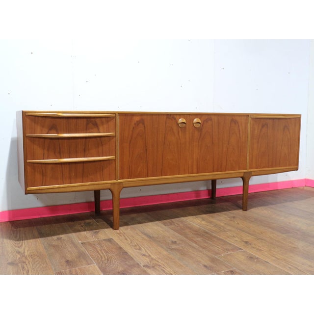 Discover a stunning classic mid-century modern credenza by Scottish furniture maker Mcintosh. This beautifully styled...