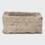 Once a common sight in courtyards throughout rural China, this textured stone vessel was used as a grain or water trough...