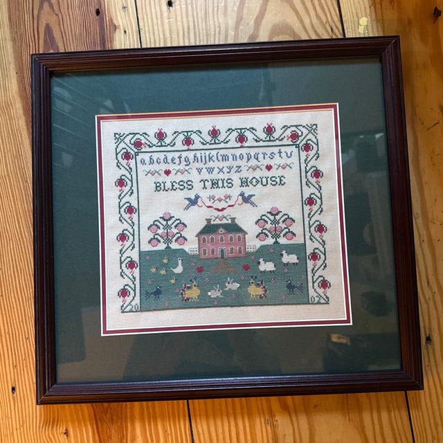 Simply adorable antique cross stitch featuring the alphabet and the words “Bless this House” The attention to detail is...