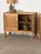 Pair of oak cabinets made in Denmark during the 1960s, each with a broad rectangular case raised on four shaped legs. The...