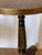 Elegant Neoclassical revival side table with beautiful inlayed top, ebonised base with bronze finials.