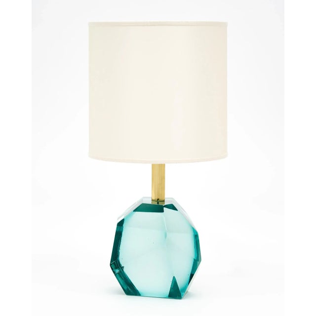 Murano glass aquamarine rock lamps signed by Alberto Dona. We love the modernity of the lamps, the abstract form, and the...