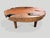 Impressive ancient teak wood coffee table floating on mid century style cone legs and finished with a natural oil...
