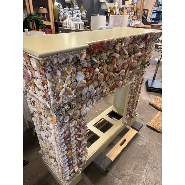 Stunning and unique vintage Palm Beach 1980s hand made solid wood beige painted structure covered with natural seashell’s...