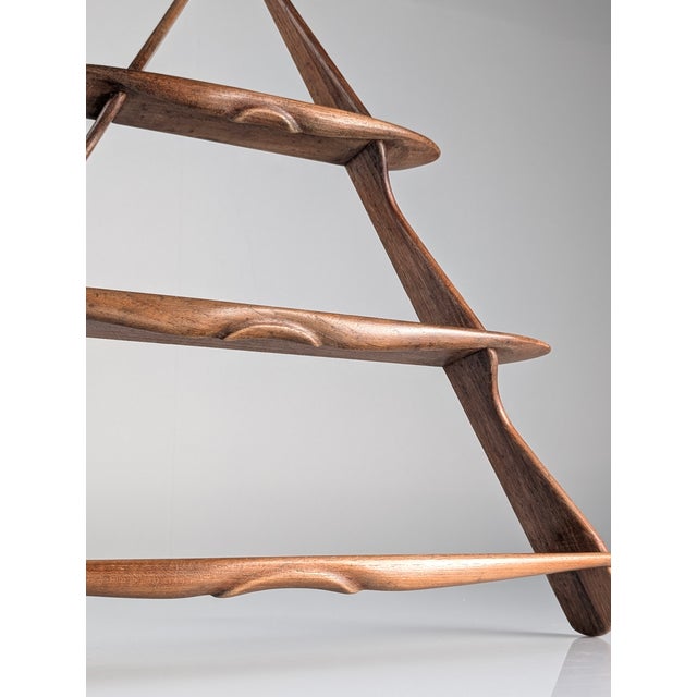 Solid wood shelf, attributed to Peder Moos and made in Denmark around 1950. This piece is strongly linked to the workshop...